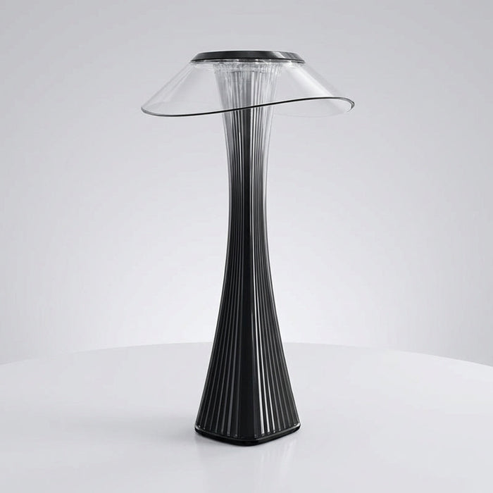 Nowoczesna lampa akcentująca z rzeźbiarskim designem, oferująca ciepłe światło idealne do 0