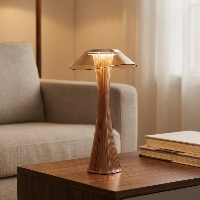 Nowoczesna lampa akcentująca z rzeźbiarskim designem, oferująca ciepłe światło idealne do 1