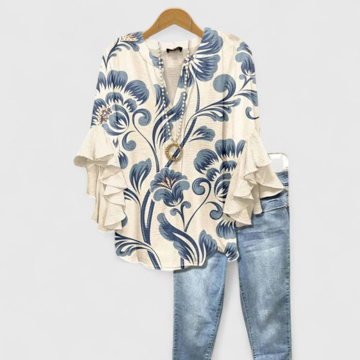 Bluzka damska z bufiastymi rękawami i kwiatowym nadrukiem – lekki top na lato dla kobiet 0